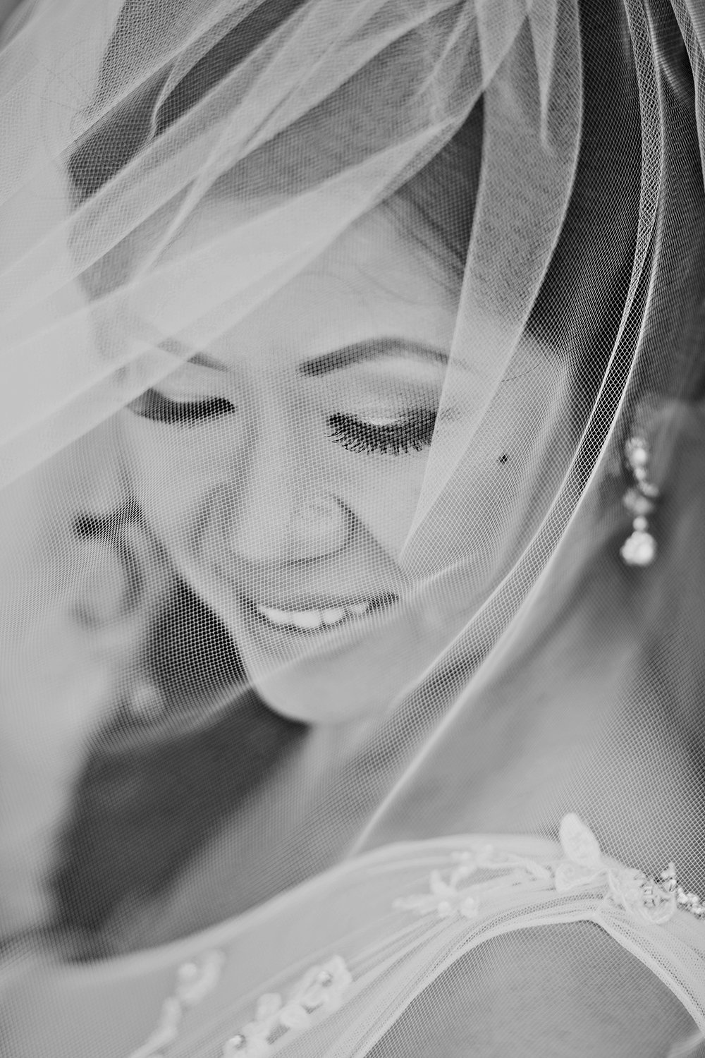Los Willows wedding photos bride with veil over face
