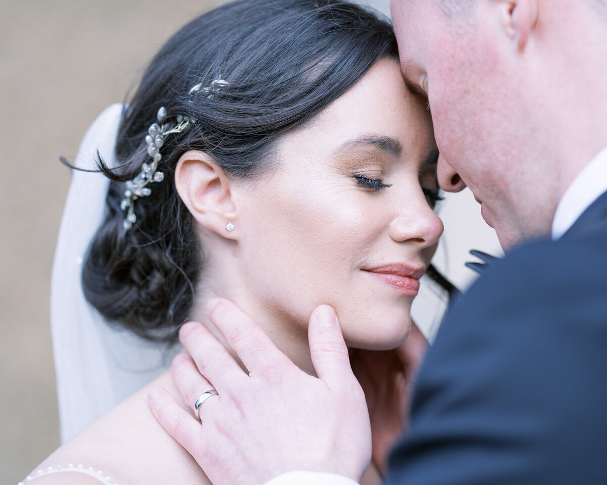 Intimate moment with bride and groom at Bourton Hall wedding venue