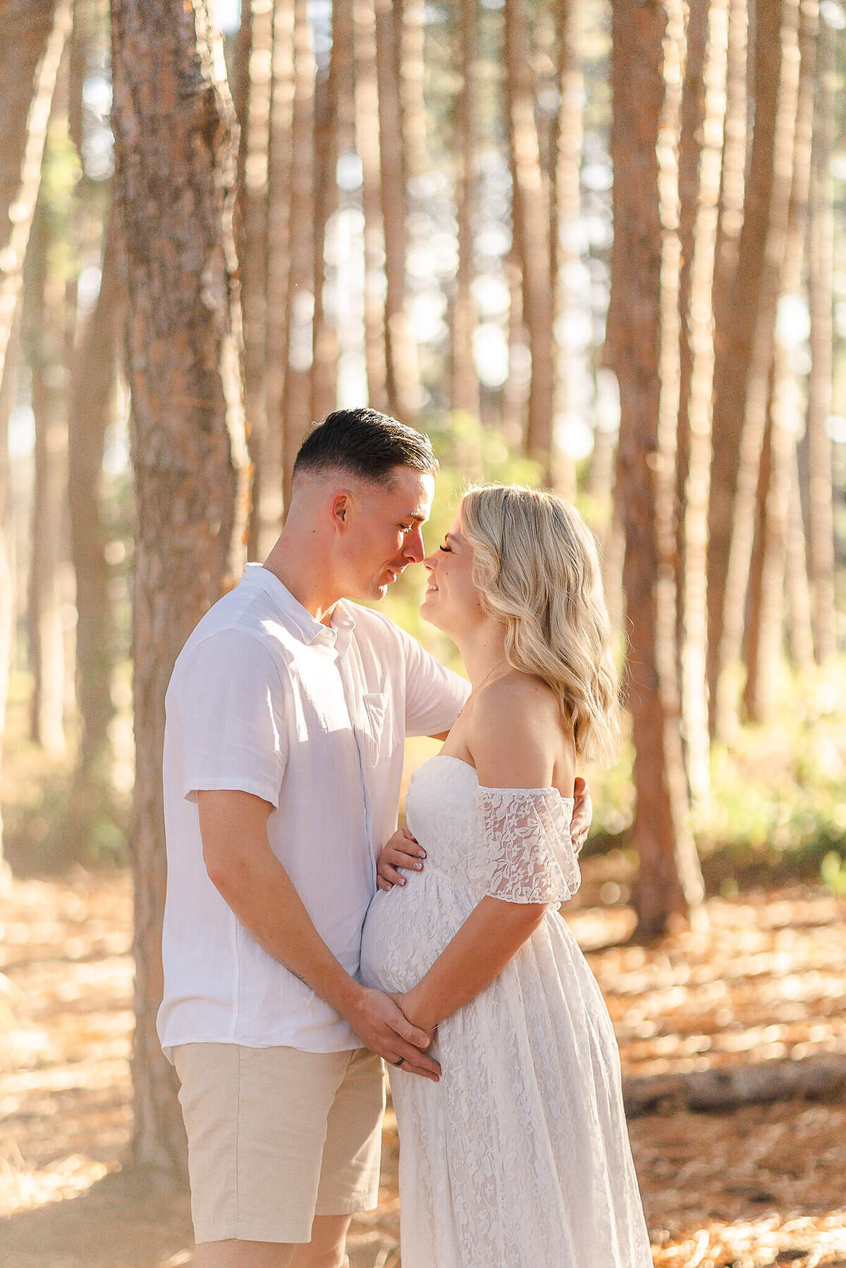 couple giving eskimo kisses intimate moment during maternity session in Gold Coast QLD