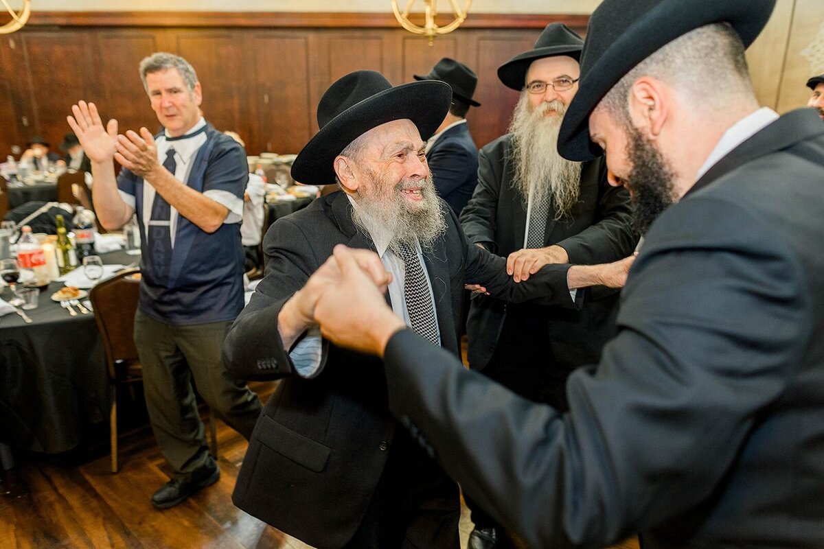 Eliana-Melmed-Photography-Chicago-LosAngeles-Jewish-WeddingPhotographer-CarmiKalman-MensDancing-00035
