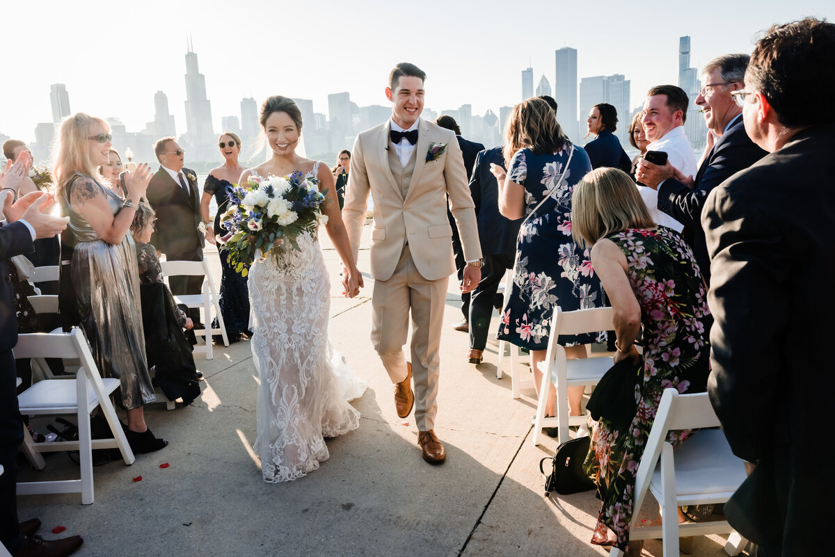 Bride and groom get married in front of the Chicago skyline