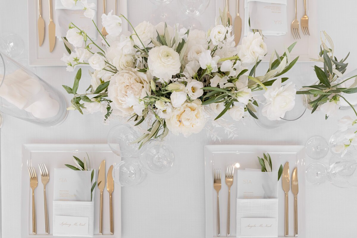 White Wedding Florals with Gold Cutlery