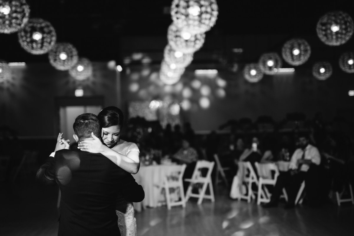 bride and groom wedding first dance black and white at Pica Pica Event Center reception hall San Antonio, Texas