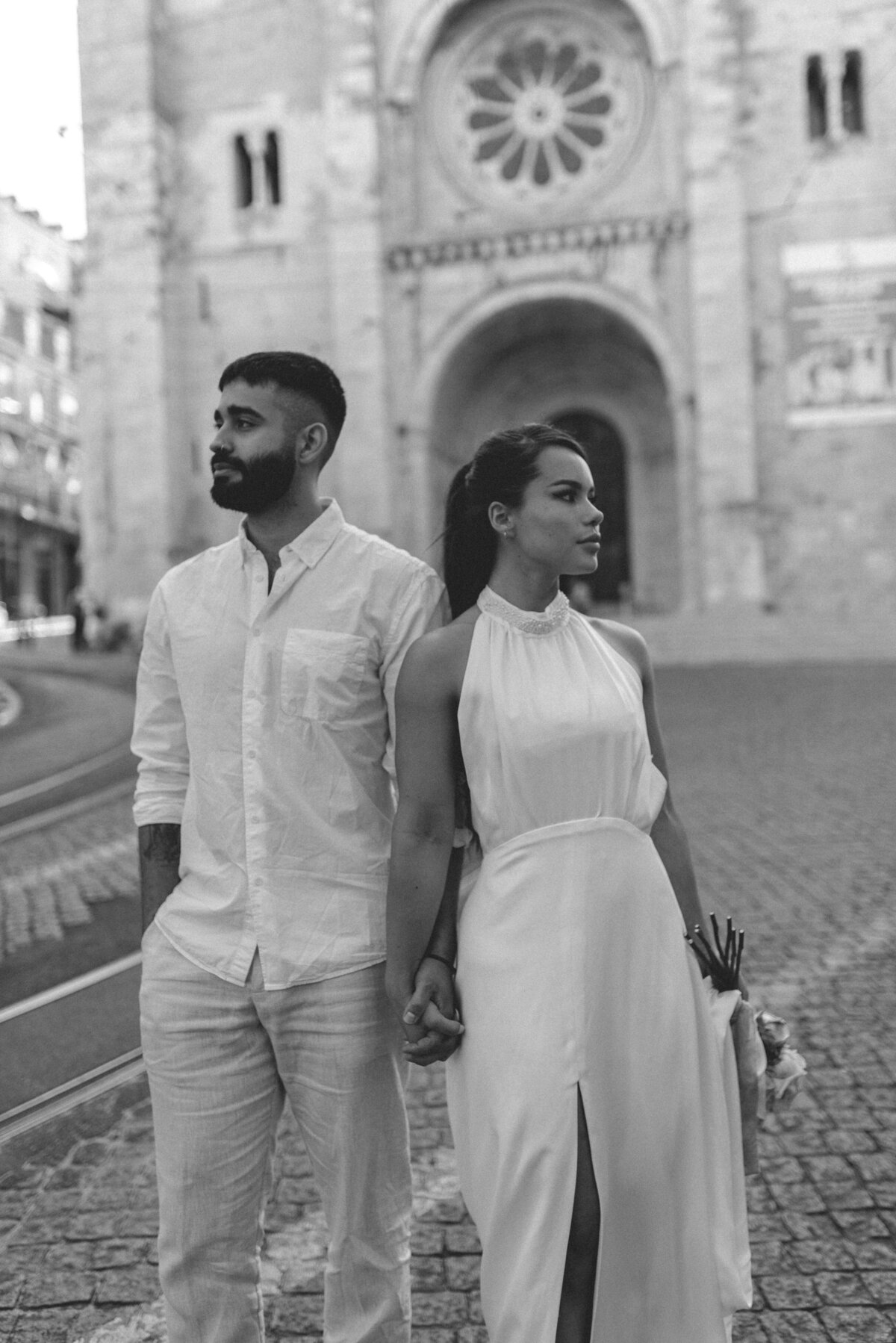 Tammie and Salvador walking in the streets of Lisbon Portugal.