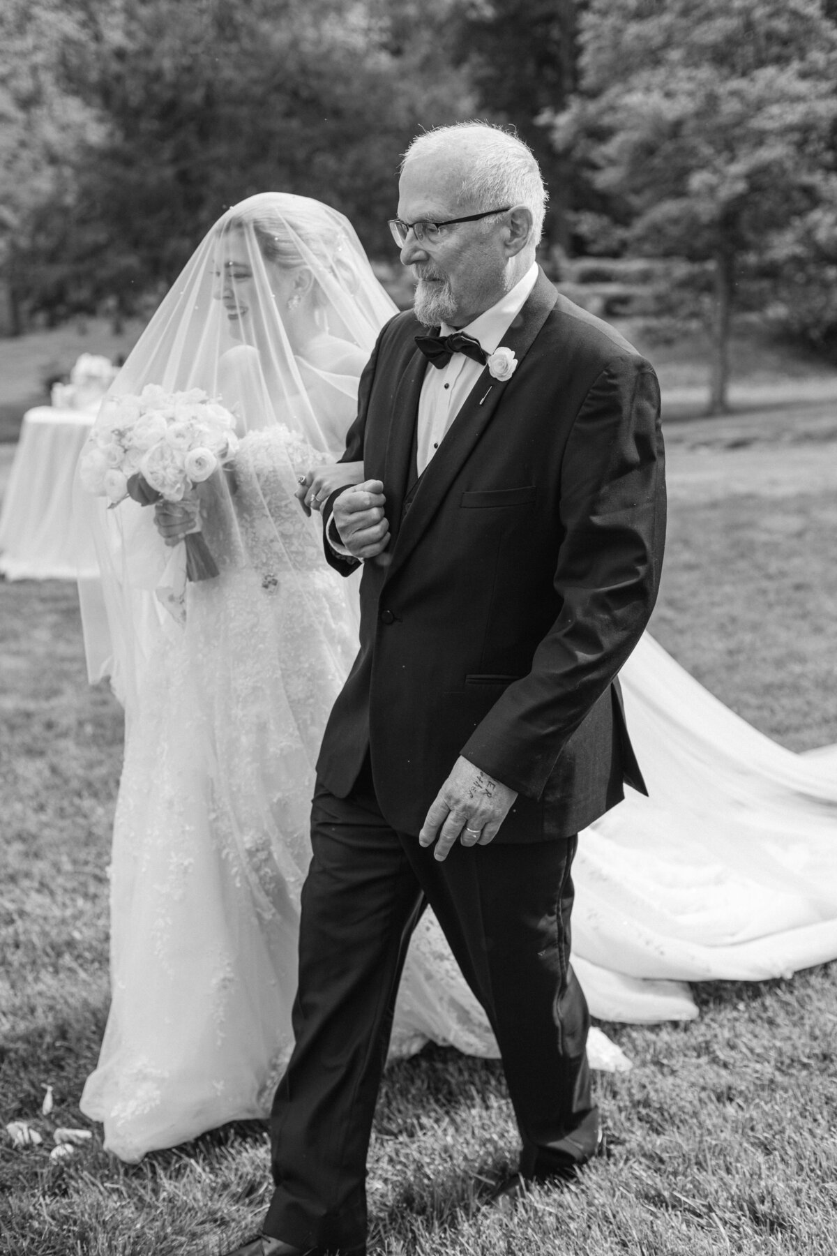 image of father of bride walking his daughter down the aisle