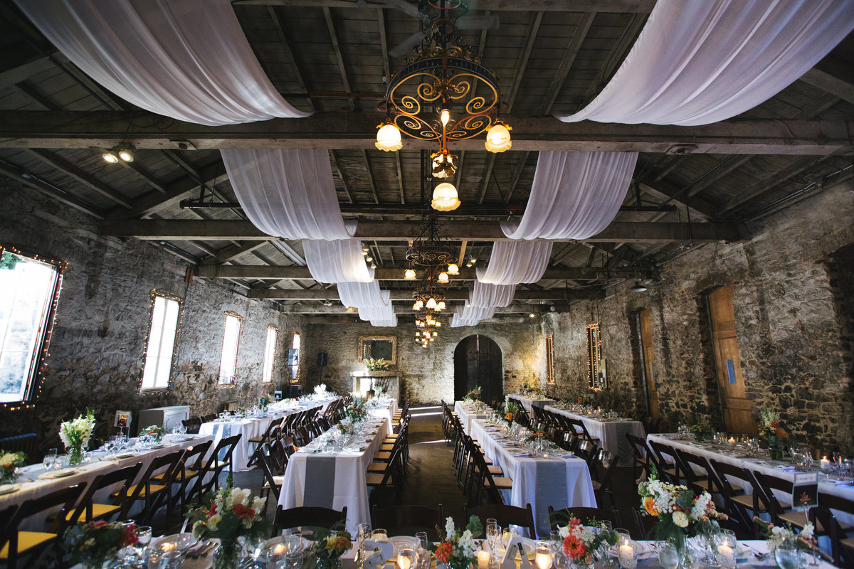 Miners Foundry Stone hall with draping wedding reception