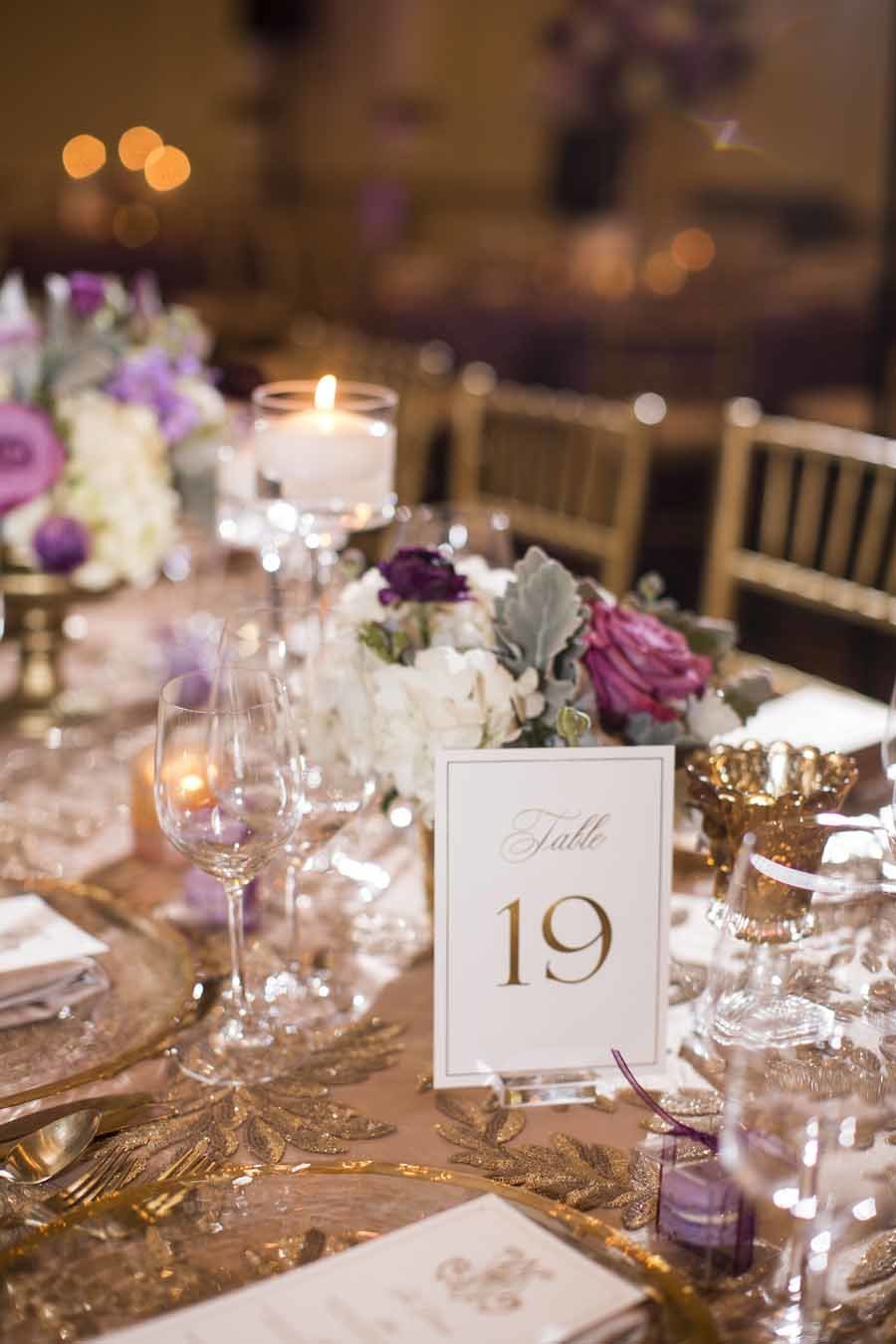 Luxurious gold and purple place setting  at this Seattle Wedding Reception