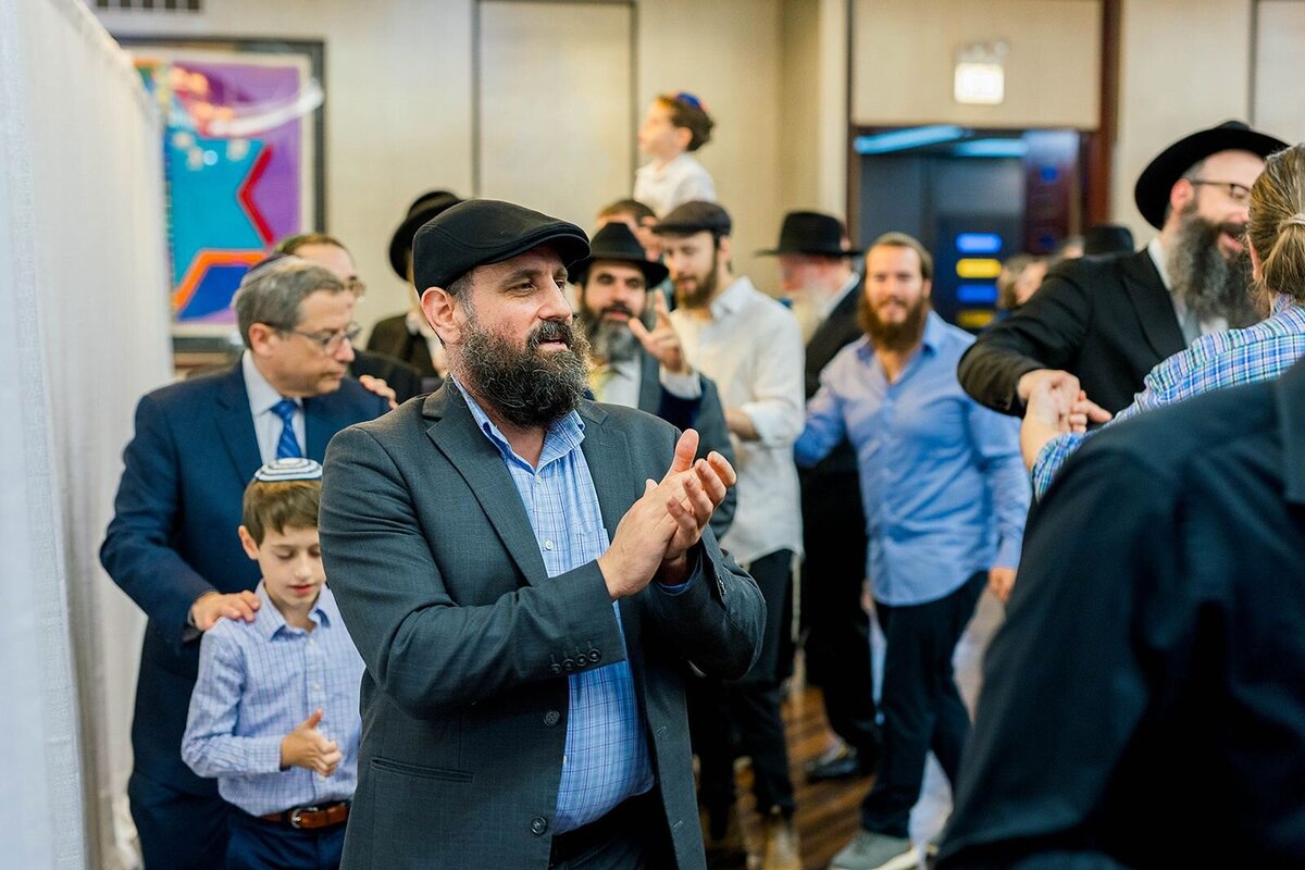 Eliana-Melmed-Photography-Chicago-LosAngeles-Jewish-WeddingPhotographer-CarmiKalman-MensDancing-00074