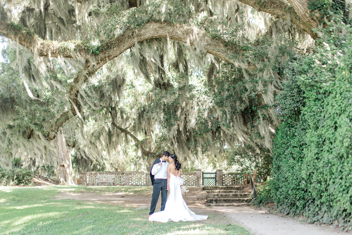 Couple shares a moment together in White Point Garden, South Carolina
