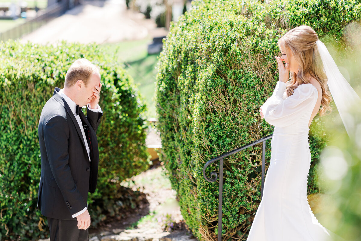 Bride and groom sharing a first look at the Greystone Inn