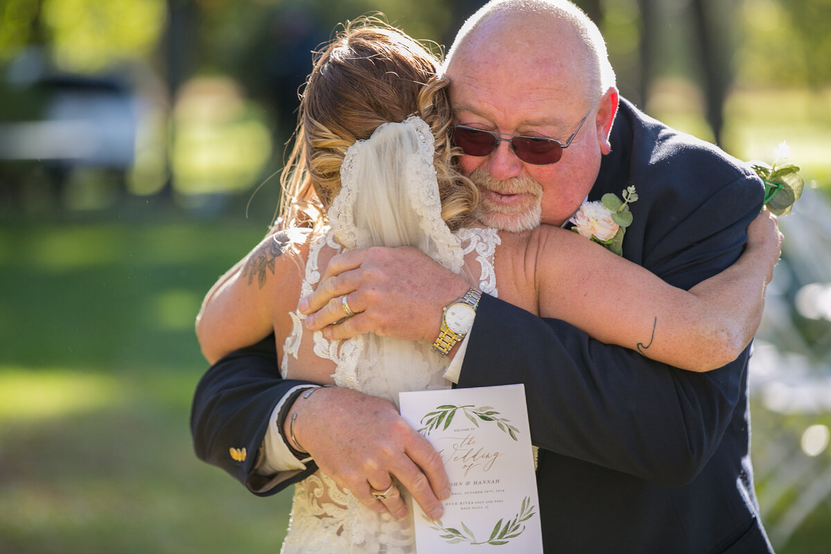 njeri-bishota-lauren-ashley-bride-father-embrace-hug-emotion-giving-away-daughter-wedding