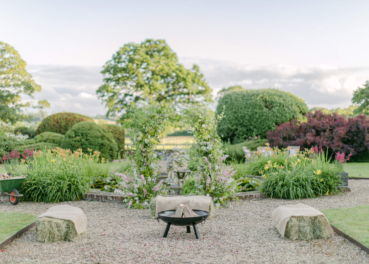 chloe-winstanley-weddings-english-garden-outdoor-seating-firepit