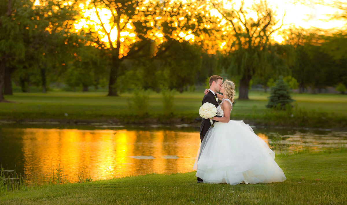 A sunset wedding photo taken next to a lake in Wicker Park.