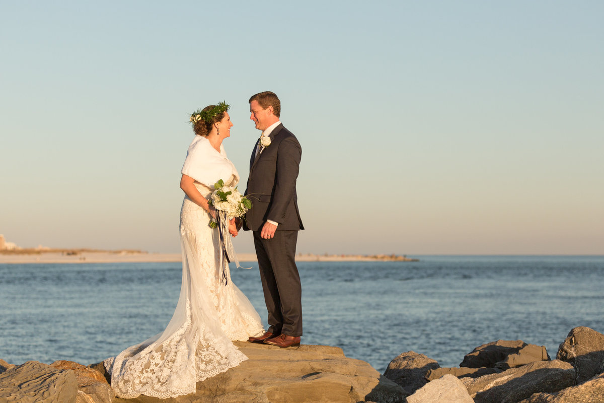 Ashley and Patrick Graves wedding day photos at sunset at The Perdido Beach Resort in Orange Beach, Alabama.