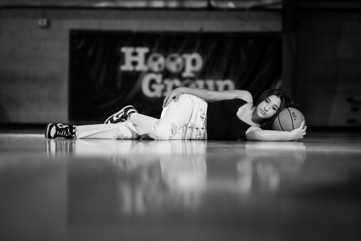 mitzvah-girl-lying-with-basketball-black-and-white