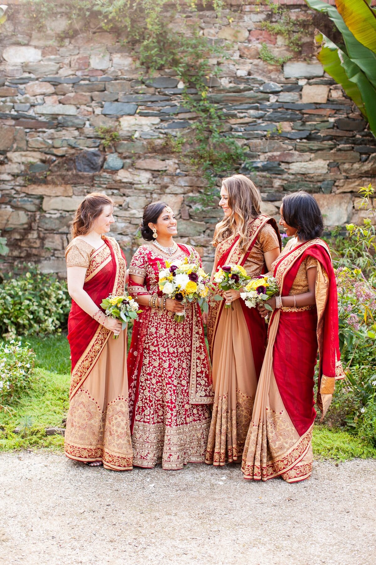 bride-bridesmaids-red-gold-saris