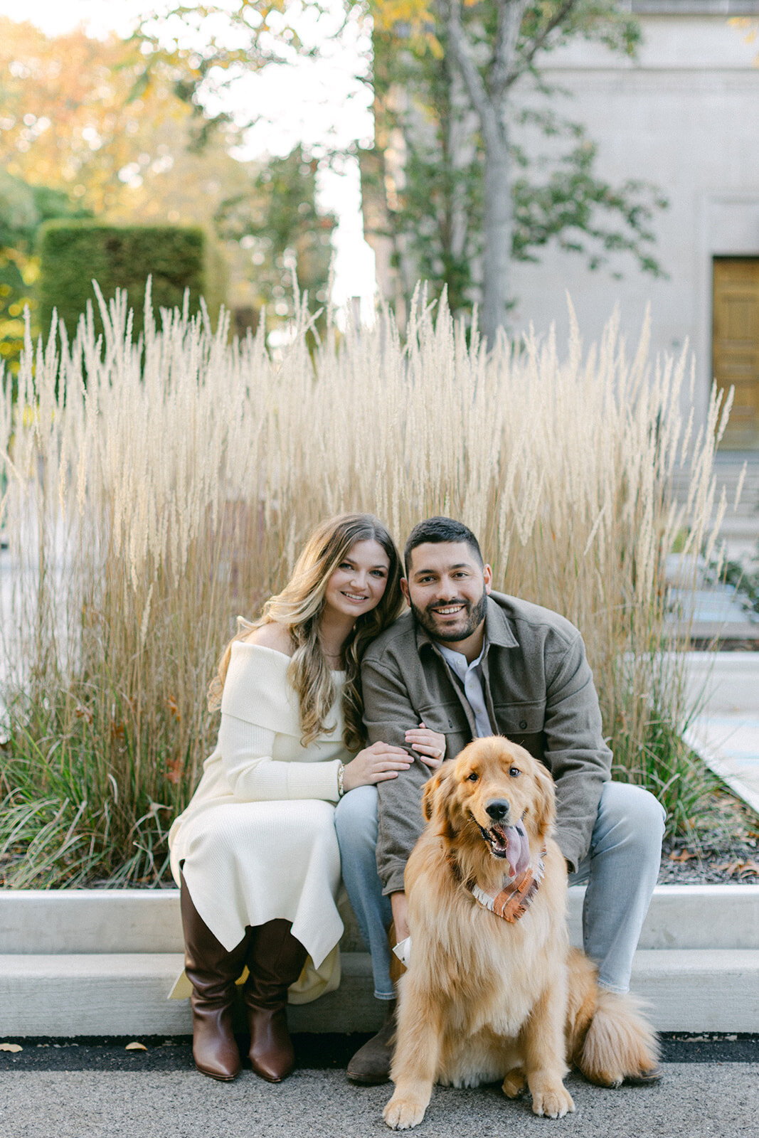 Couple embracing during golden hour engagement session in a Pittsburgh park