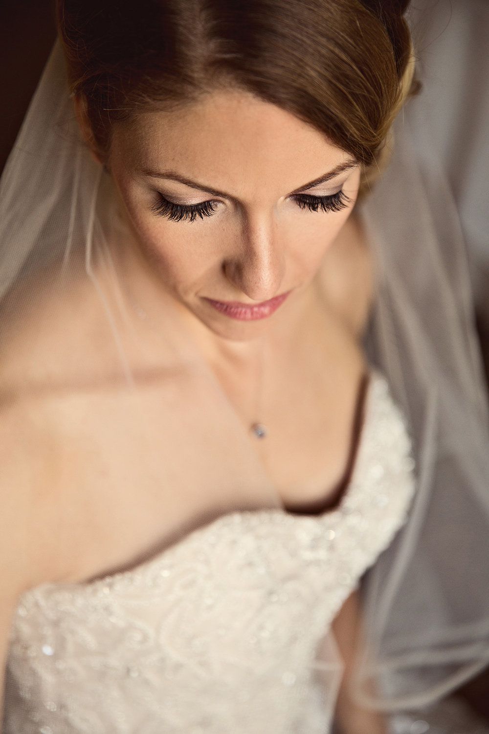 L'Auberge Del Mar wedding photos bride looking down eyelashes