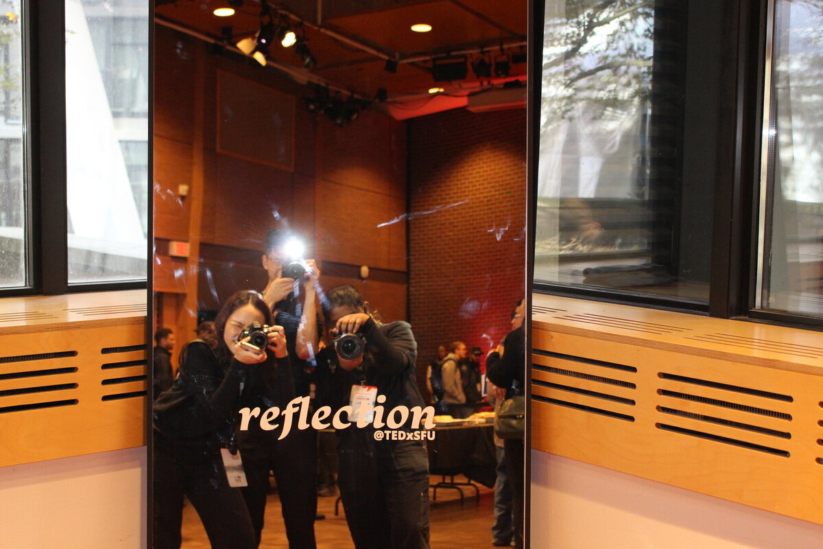 Glass mirror with the words "reflection"