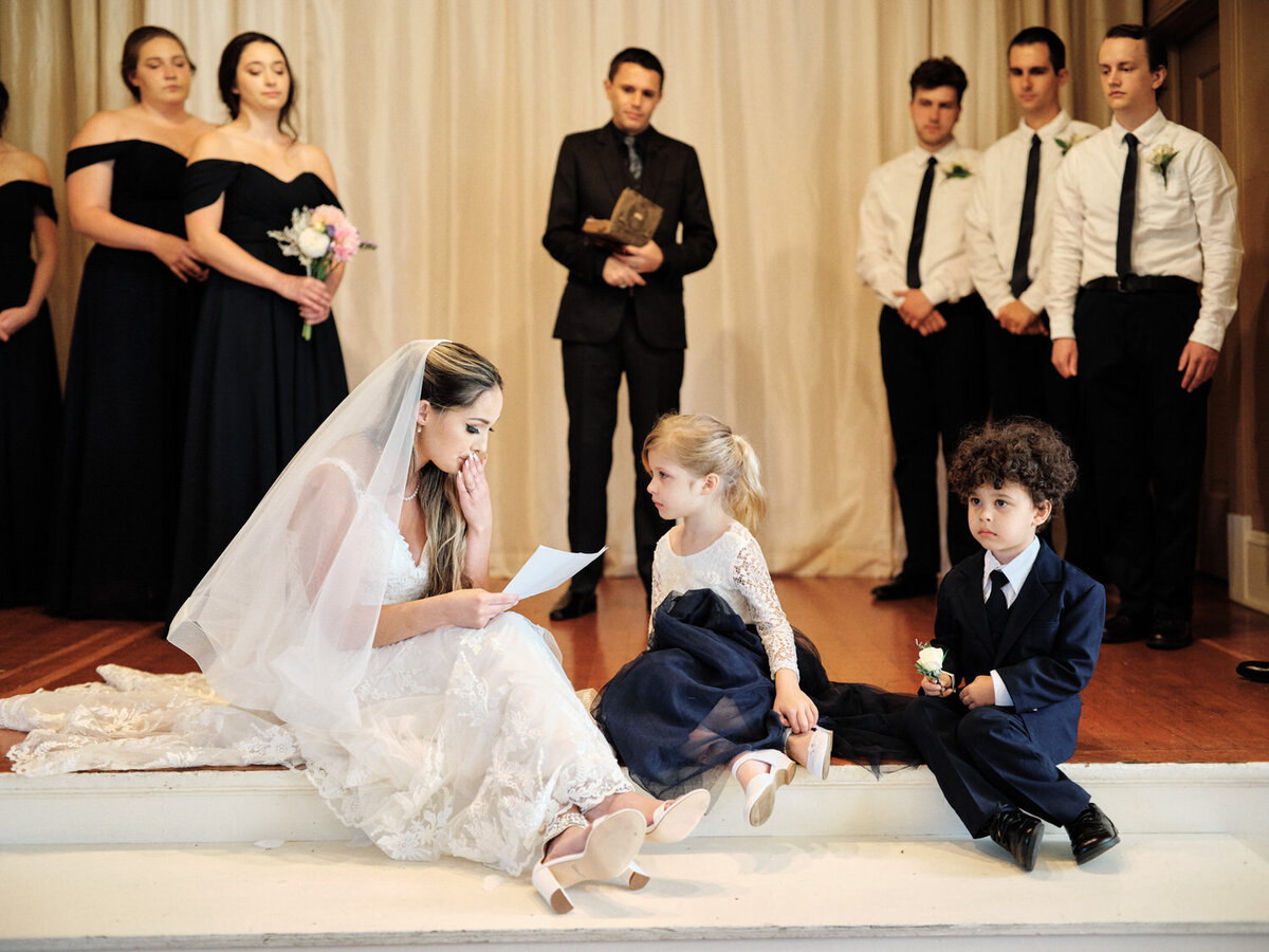 Bride holds back tears as she  reads special vows to her step-children
