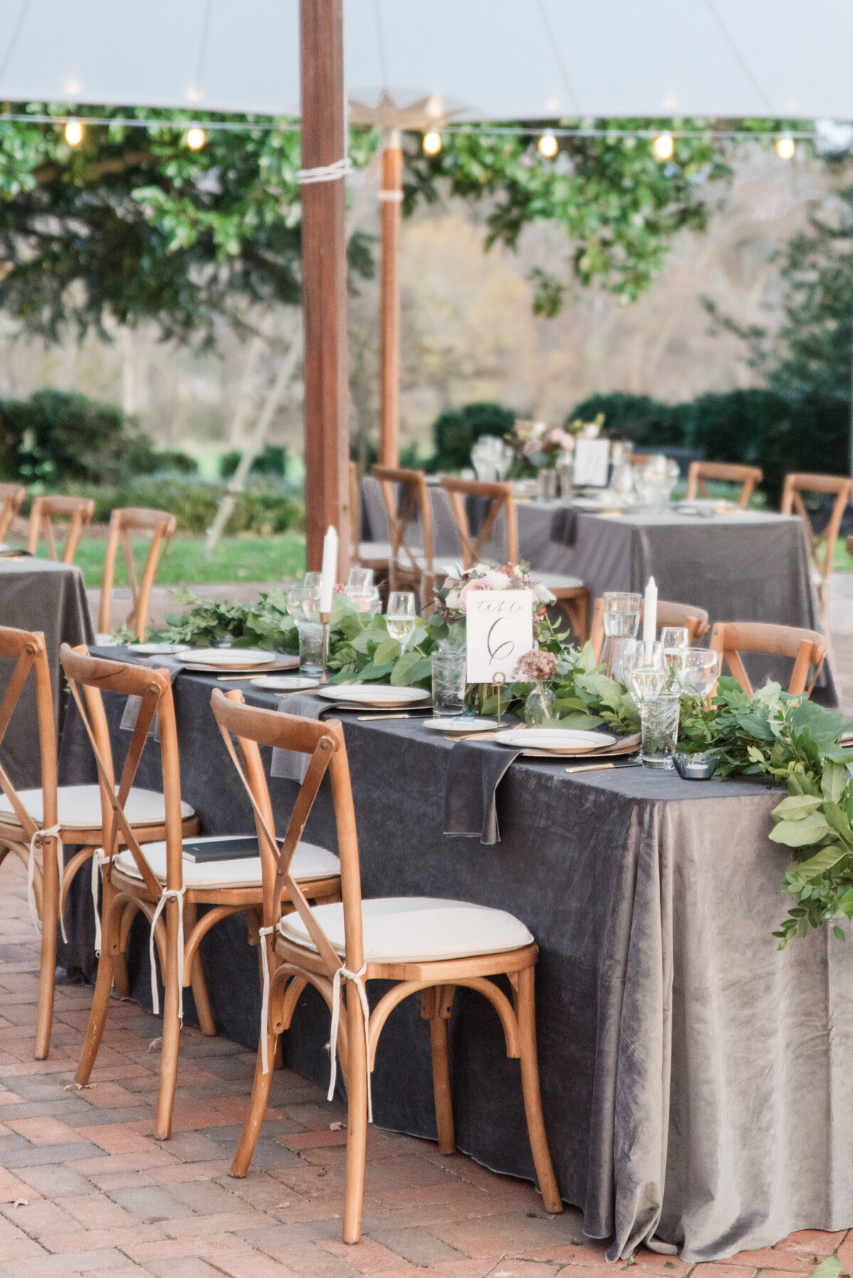 gray vlvet table cloth with greenery