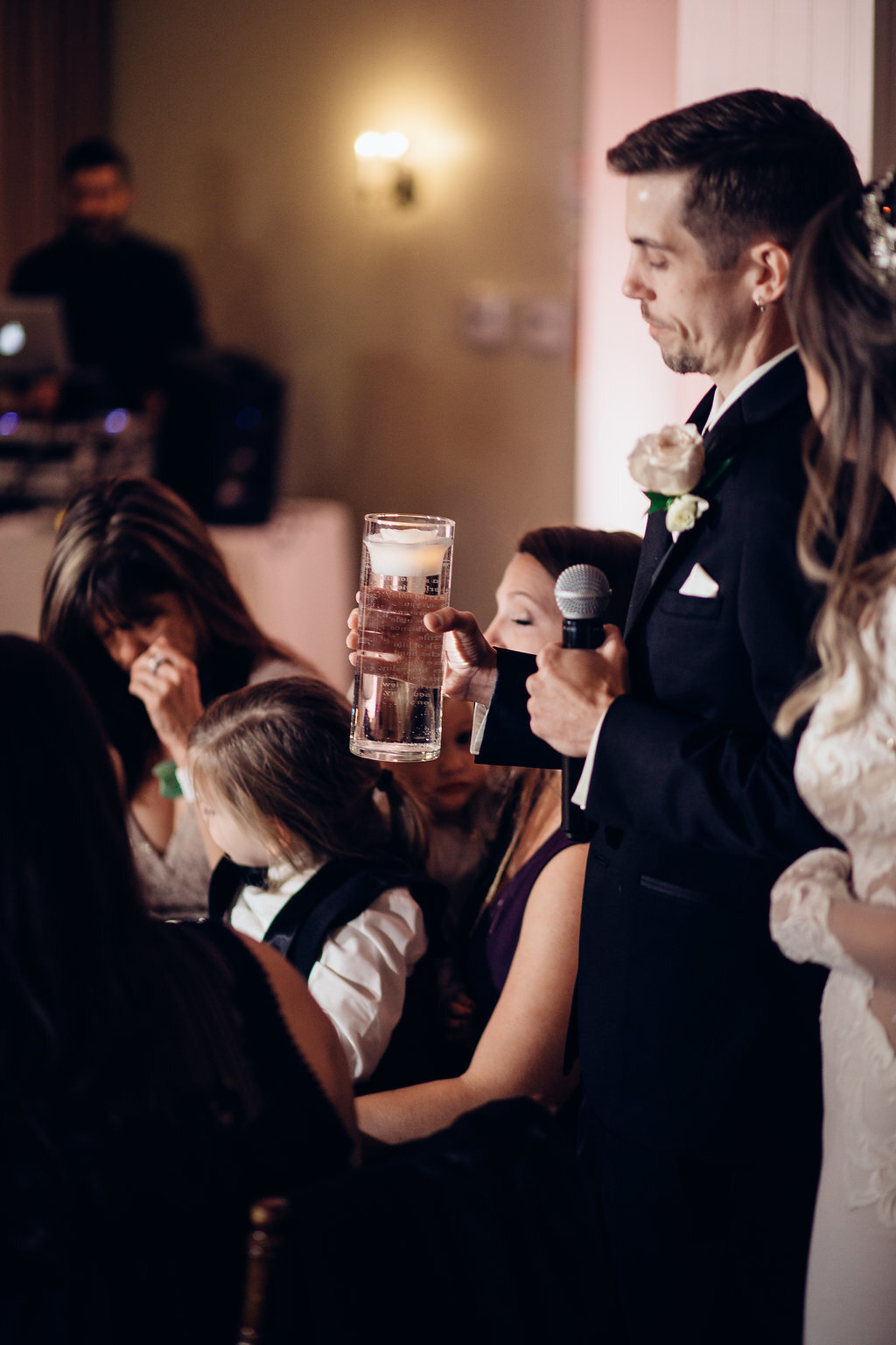 Wedding Photograph Of Groom Holding a Glass And a Microphone While Standing Los Angeles