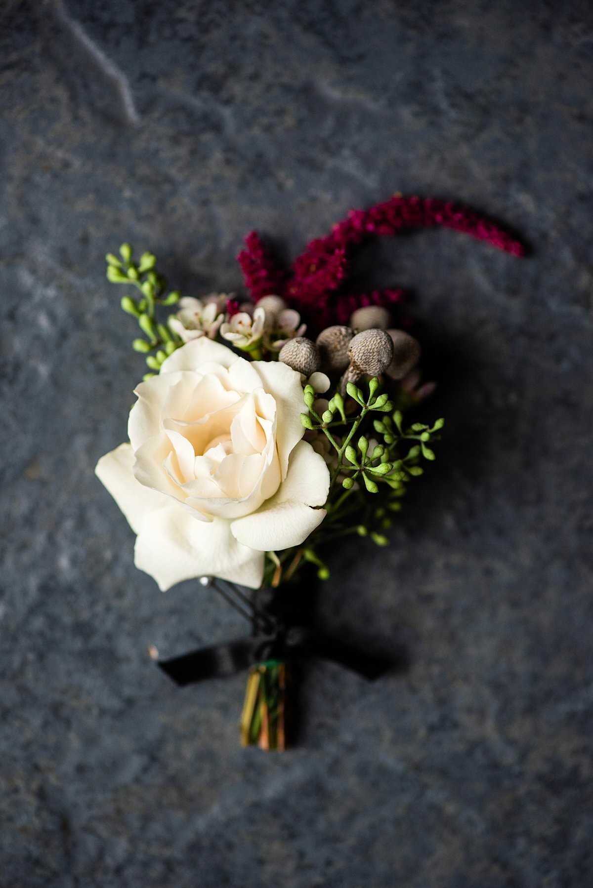 Detail photo of grooms boutonniere
