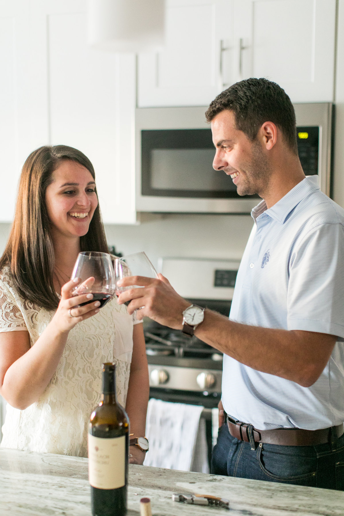 Wine at home engagement session in baltimore