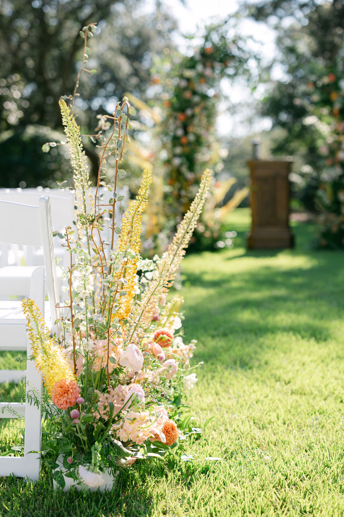 destination-wedding-ceremony-aisle-flowers