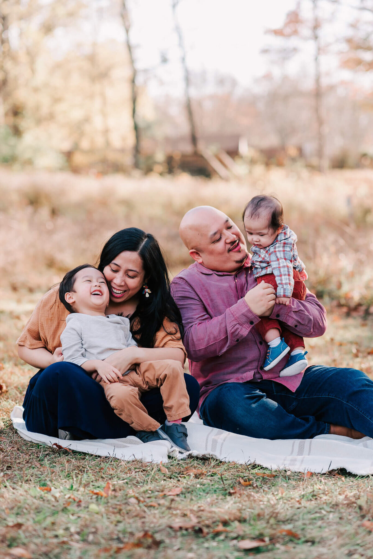 joyful photography of a family of four in Northern Virginia captured by Denise Van