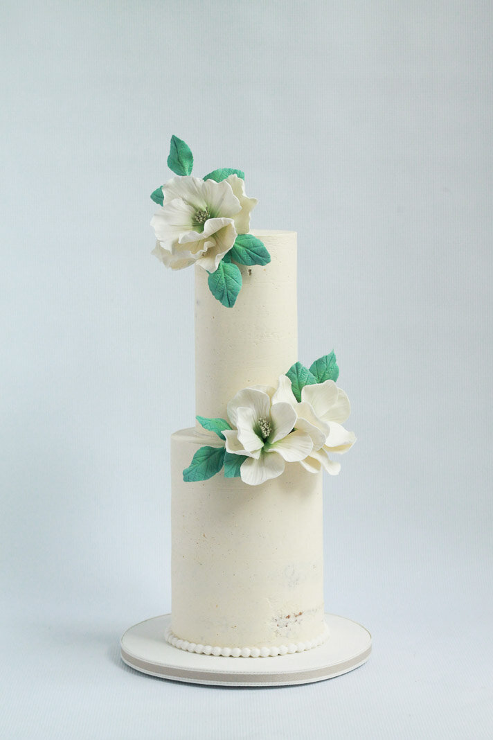 two tier butercream wedding cake with flowers, Hamilton ON wedding cakes