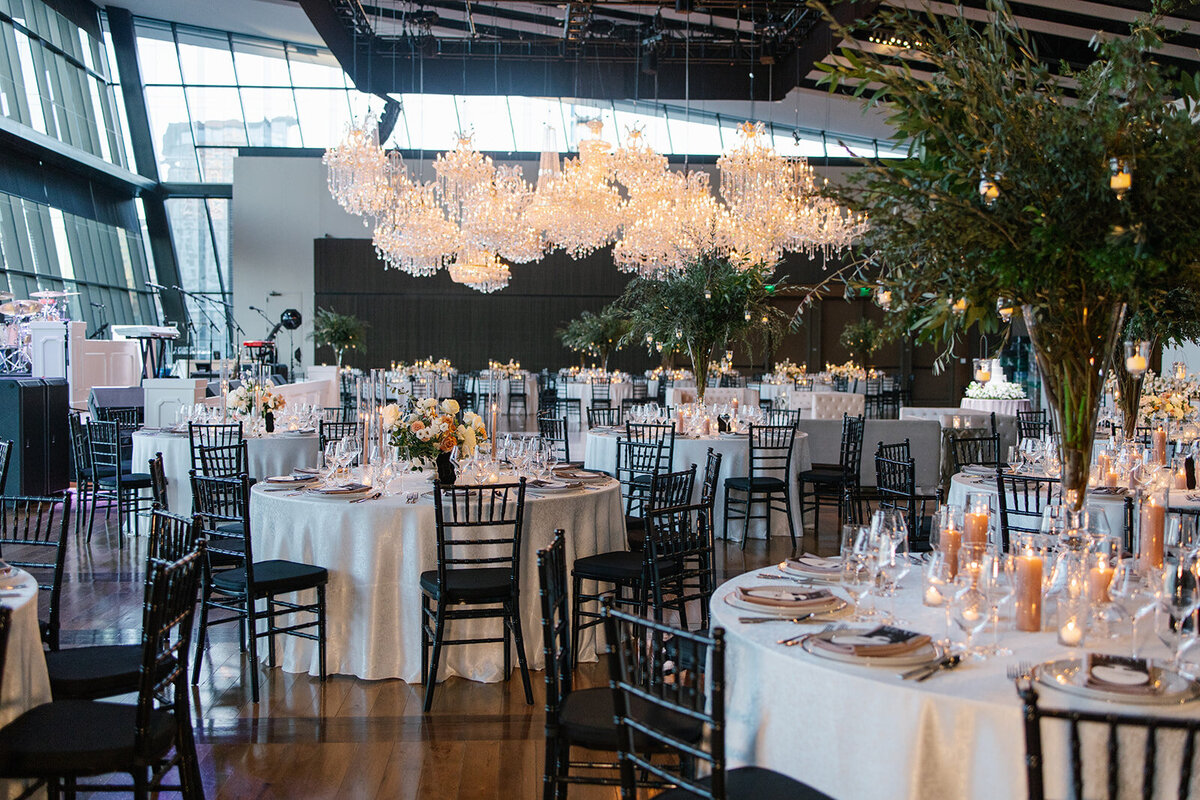black and white wedding with green tree centerpieces