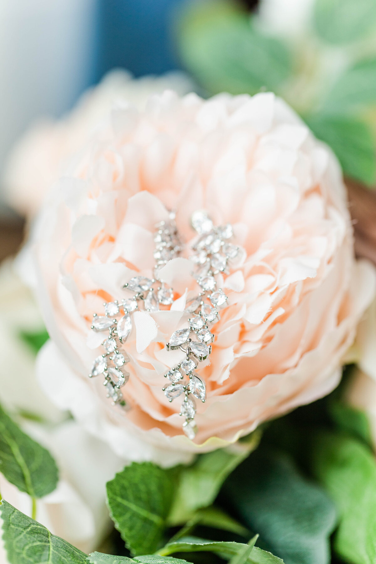 wedding earrings in a pink flower