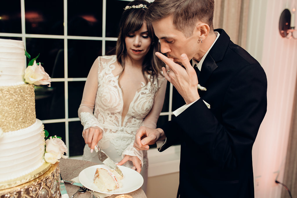 Wedding Photograph Of Groom Tasting The Cake los Angeles