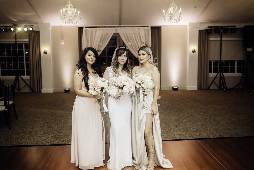 Wedding Photograph Of Bride And Two Bridesmaid Carrying Bouquet Los Angeles