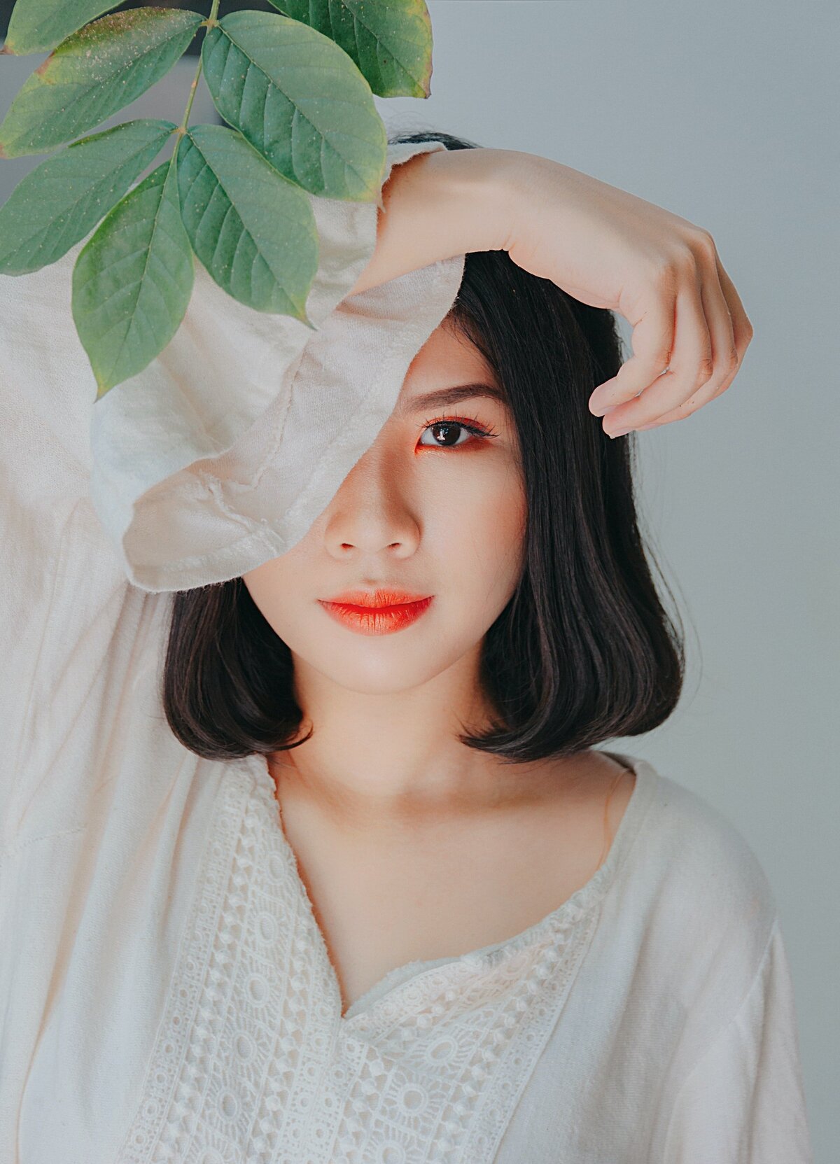 woman-posing-with-plant