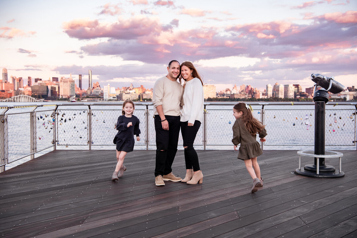 Hoboken, New York skyline, skyline, family pictures, sunset pictures, golden hours pictures, mother and father, daughters, twins, family photoshoot