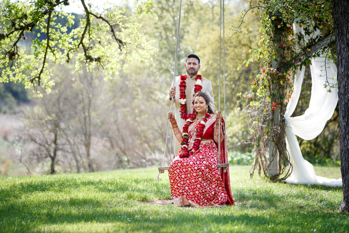 Indian wedding photographer bride groom swing natural light traditional 10601 B Derecho Drive, Austin, TX 78737