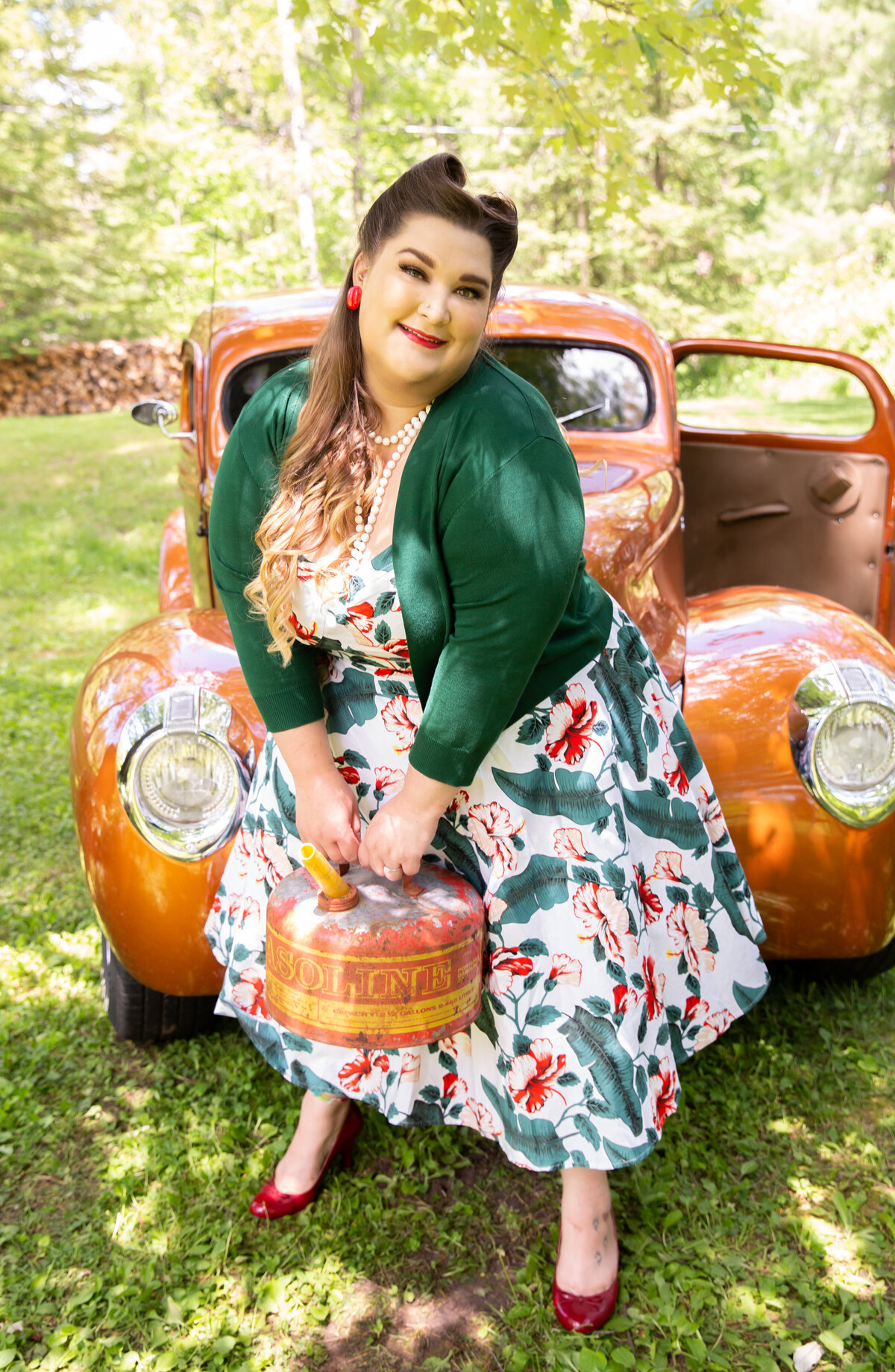 goddess studio boudoir woman pinup special old gas can old ford pickup red heels red green dress green cardigan