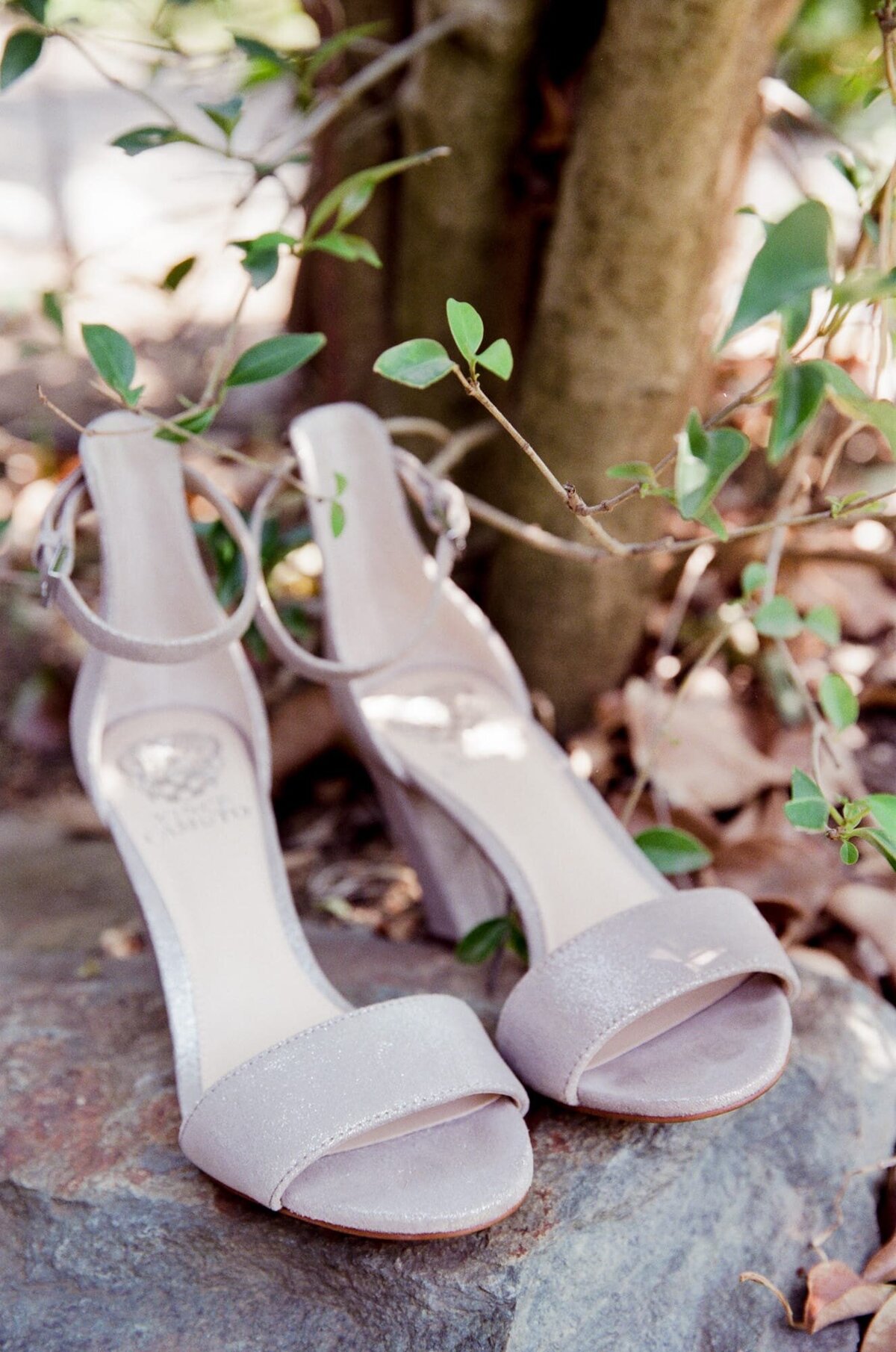 White wedding sandals photographed by farm wedding photographer Robin Jolin.