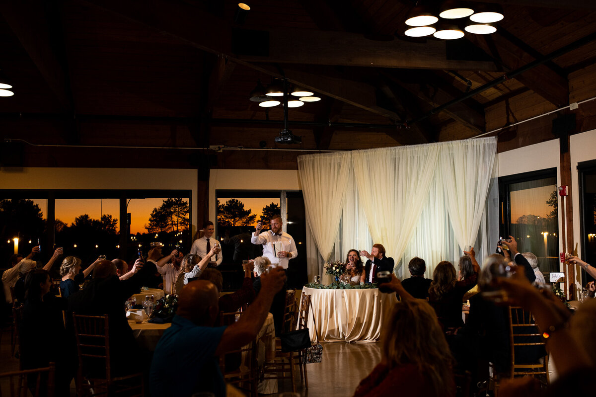 Best man toasts newlyweds at their wedding reception in Columbus Ohio
