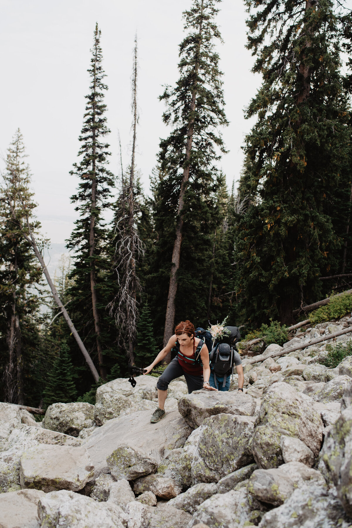 Jackson Hole photographers capture woman climbing rocks during hike