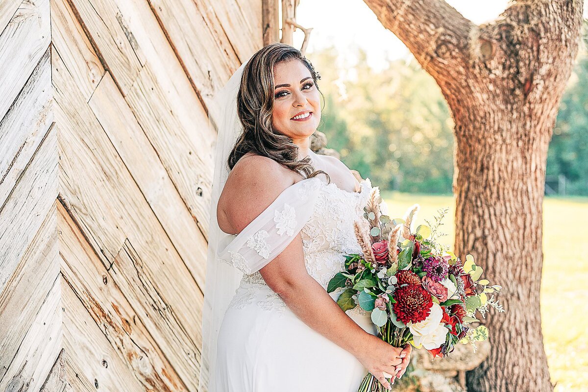 bride with bouquet posing at Bending Branch Ranch