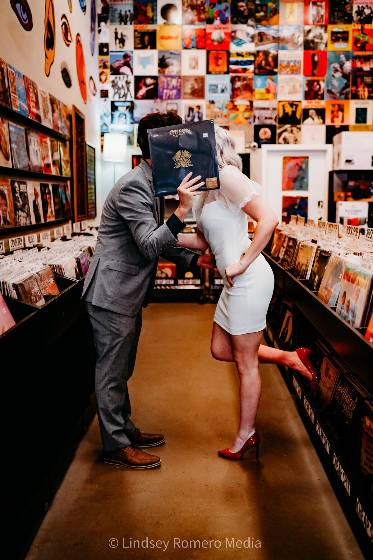record store engagement photos and elopement pose in Lafayette, la