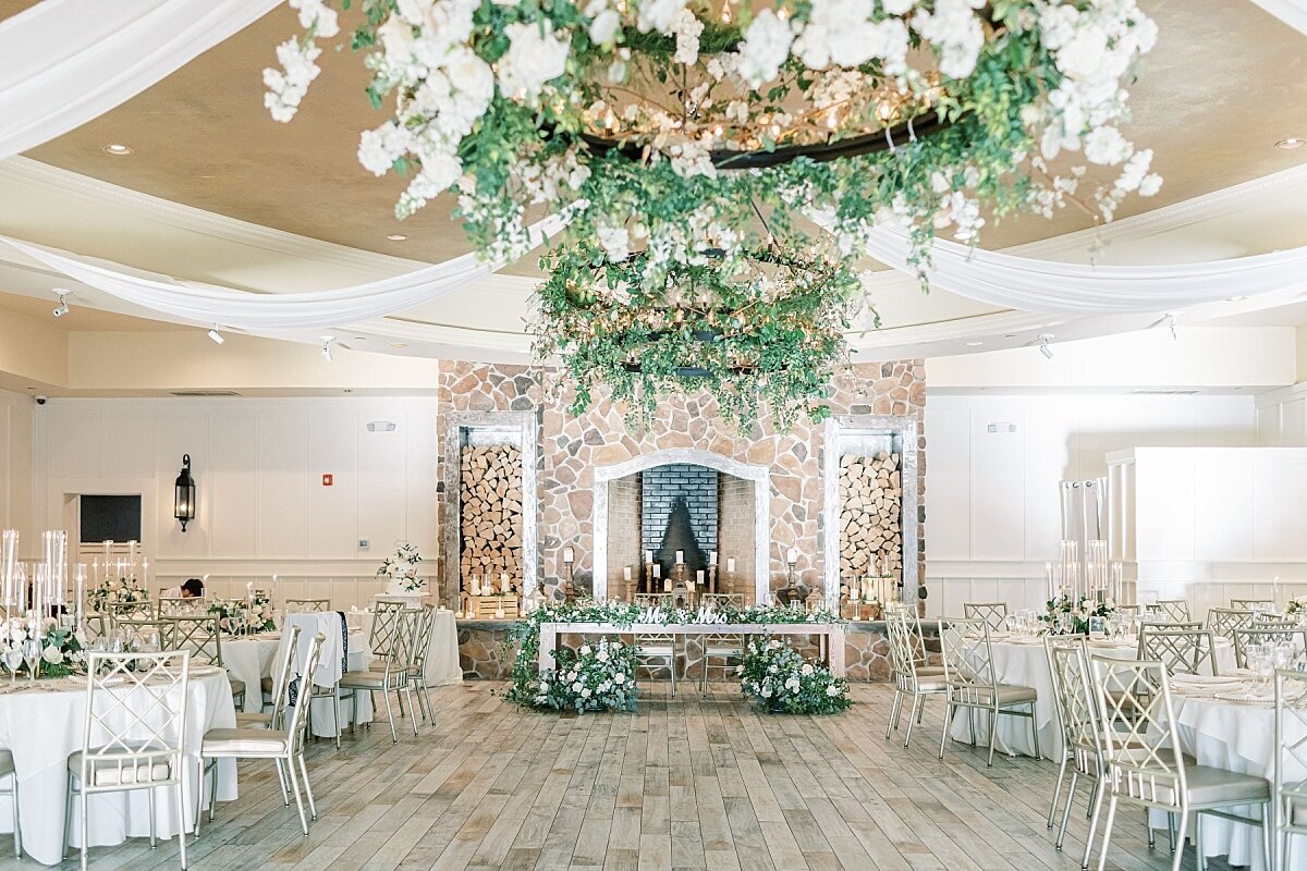 Reception room at the Farmhouse NJ with flower on chandelier