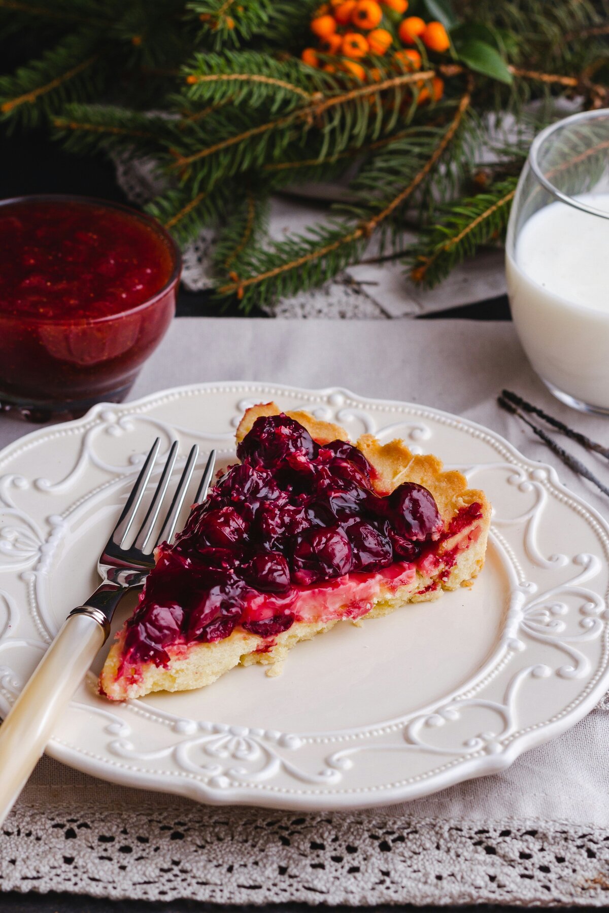 berry tart slice on white plate