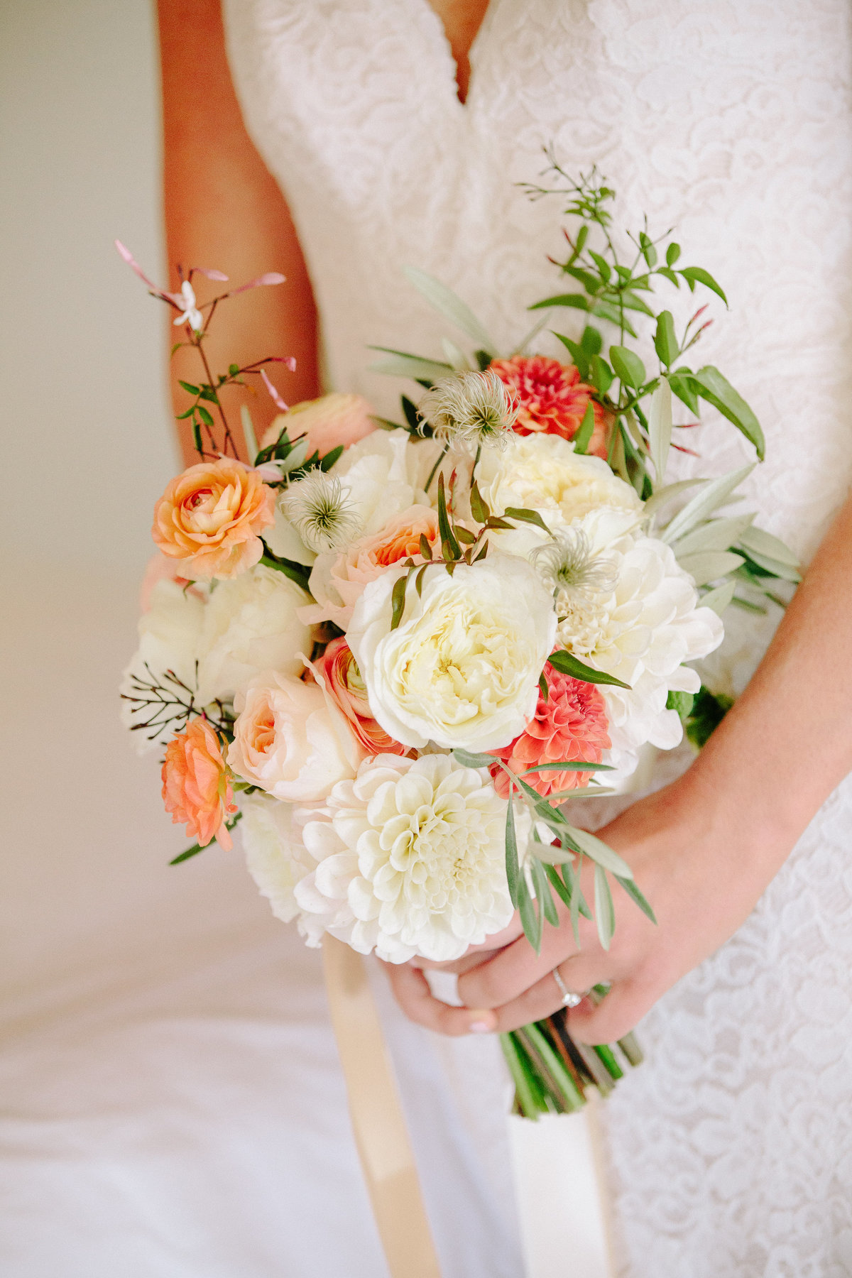 Peach and white bridal bouquet for a wedding at Beltane Ranch in Sonoma.