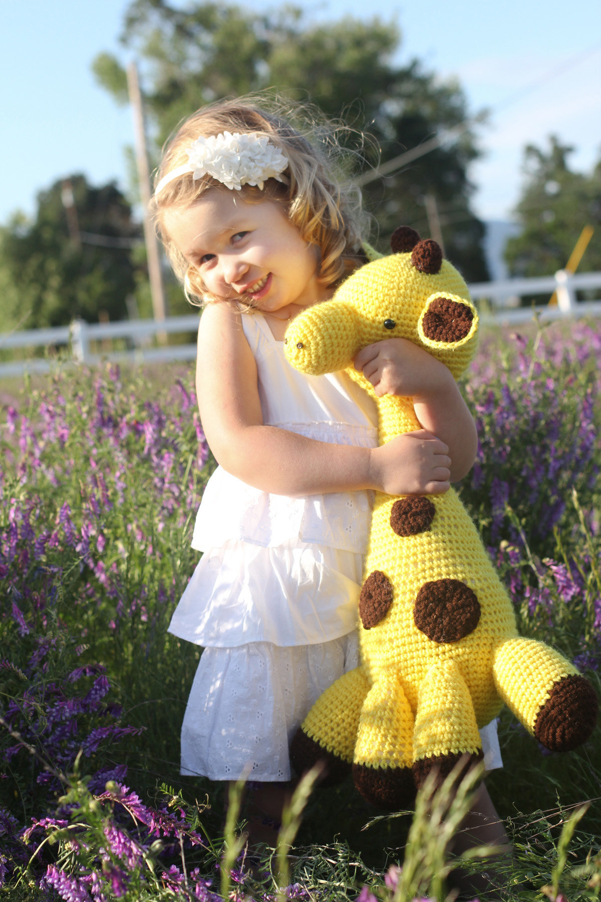 little girl and giraffe