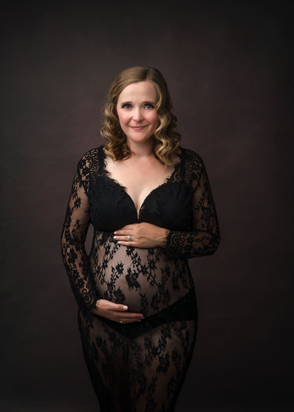 picture of pregnant woman in lace maternity gown