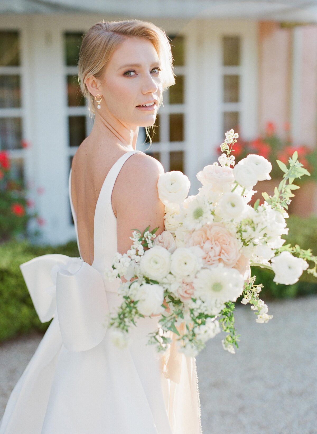 closeup shot of a bride holding her bouquet